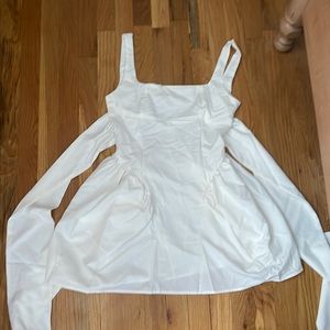 High waisted white dress with big bow tied back